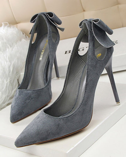 Suede Shallow Pointed Cutout Bow Sneakers